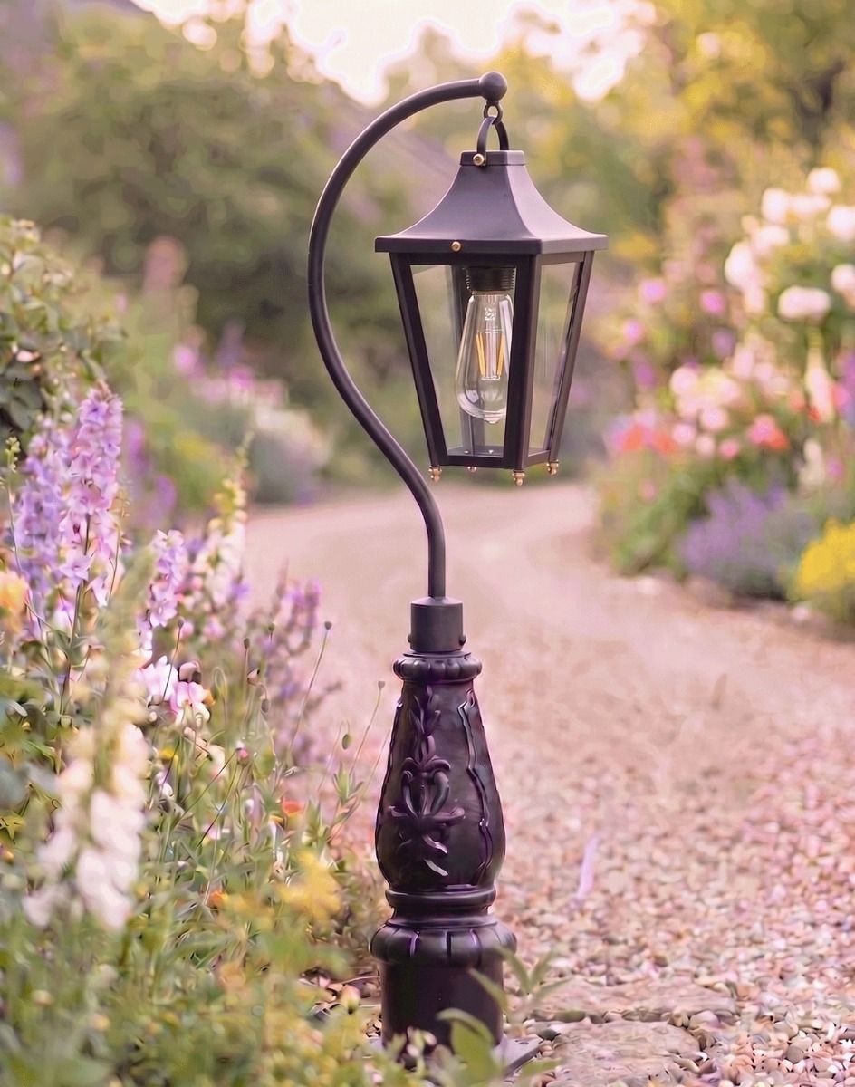 Digital Illustration of the 112cm Black “Lincoln” Swan Neck Lantern & Lamp Post Placed next to a Flowery Gravel Driveway Entrance
