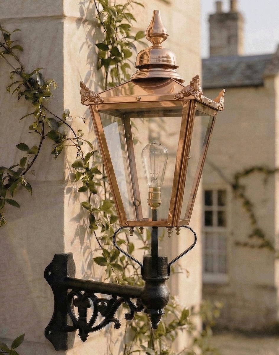 Digital Illustration of the 115 x 51cm Copper Wall Lantern on Corner Bracket Mounted on a Sandstone Brick Exterior Wall