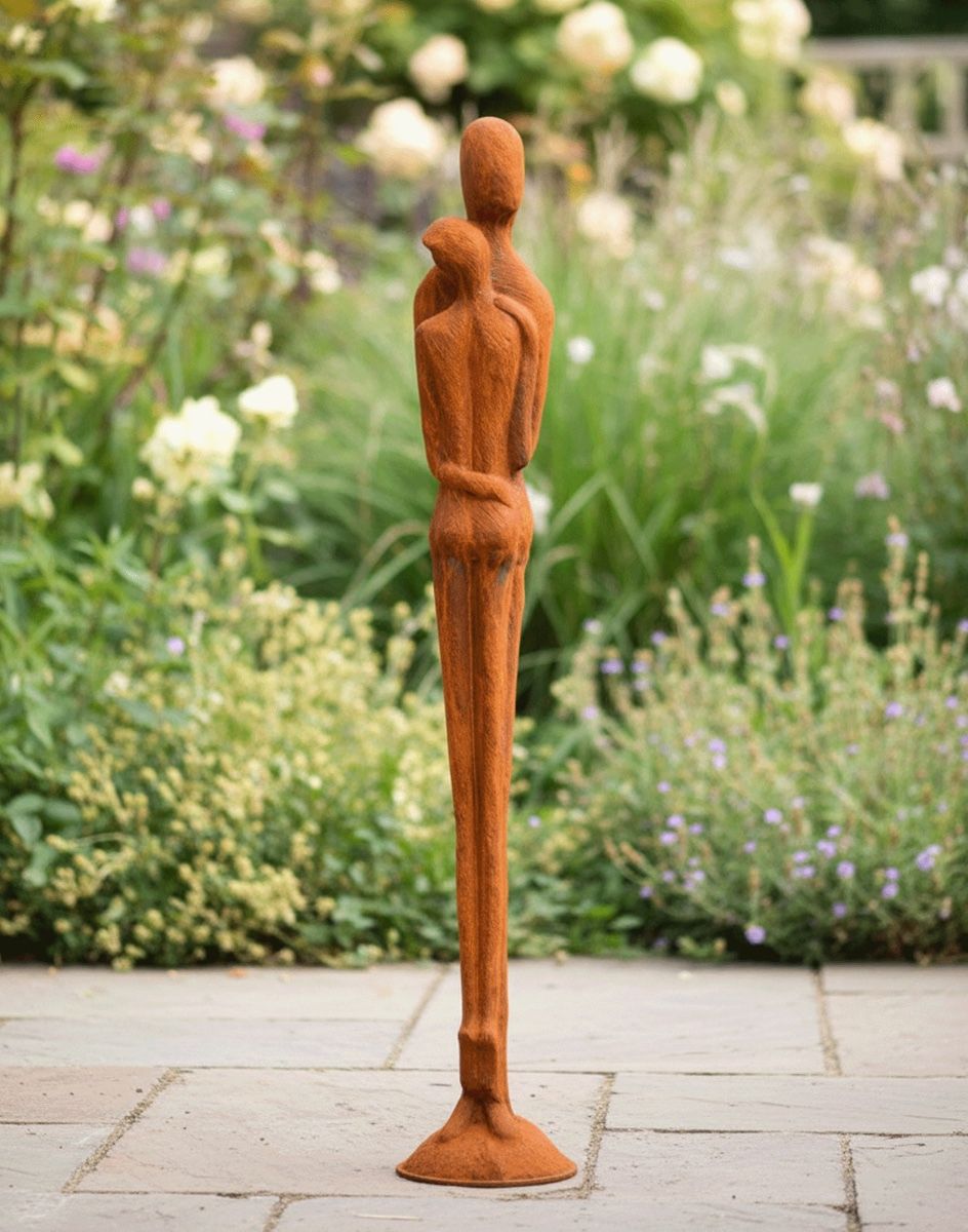 Digital Illustration of the 130cm tall "The Loving Couple" Cast Iron Garden Sculpture Placed on a Sunny Garden Patio 