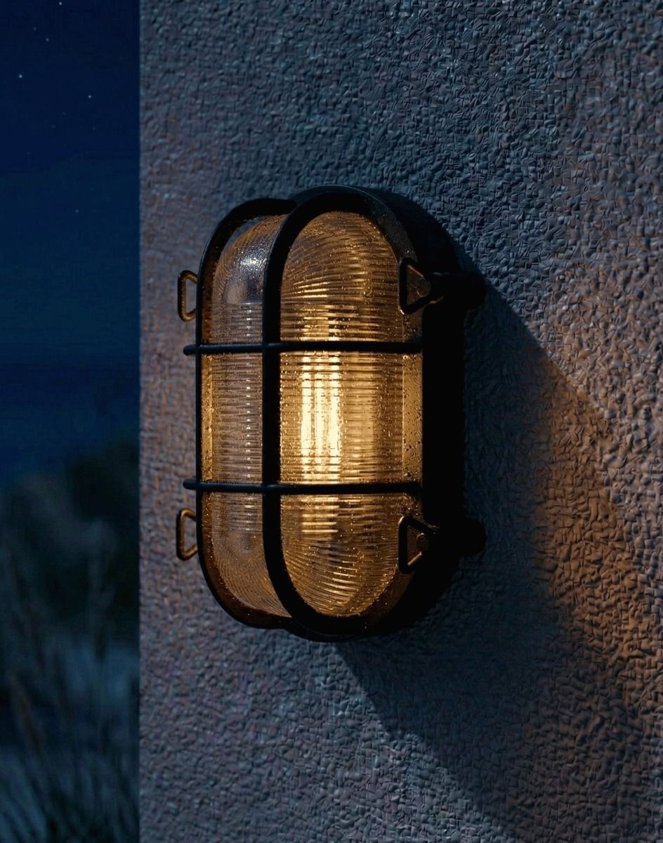 Digital Illustration of the 20cm "Newhaven" Nautical Bulkhead Wall Light Lit up at Night