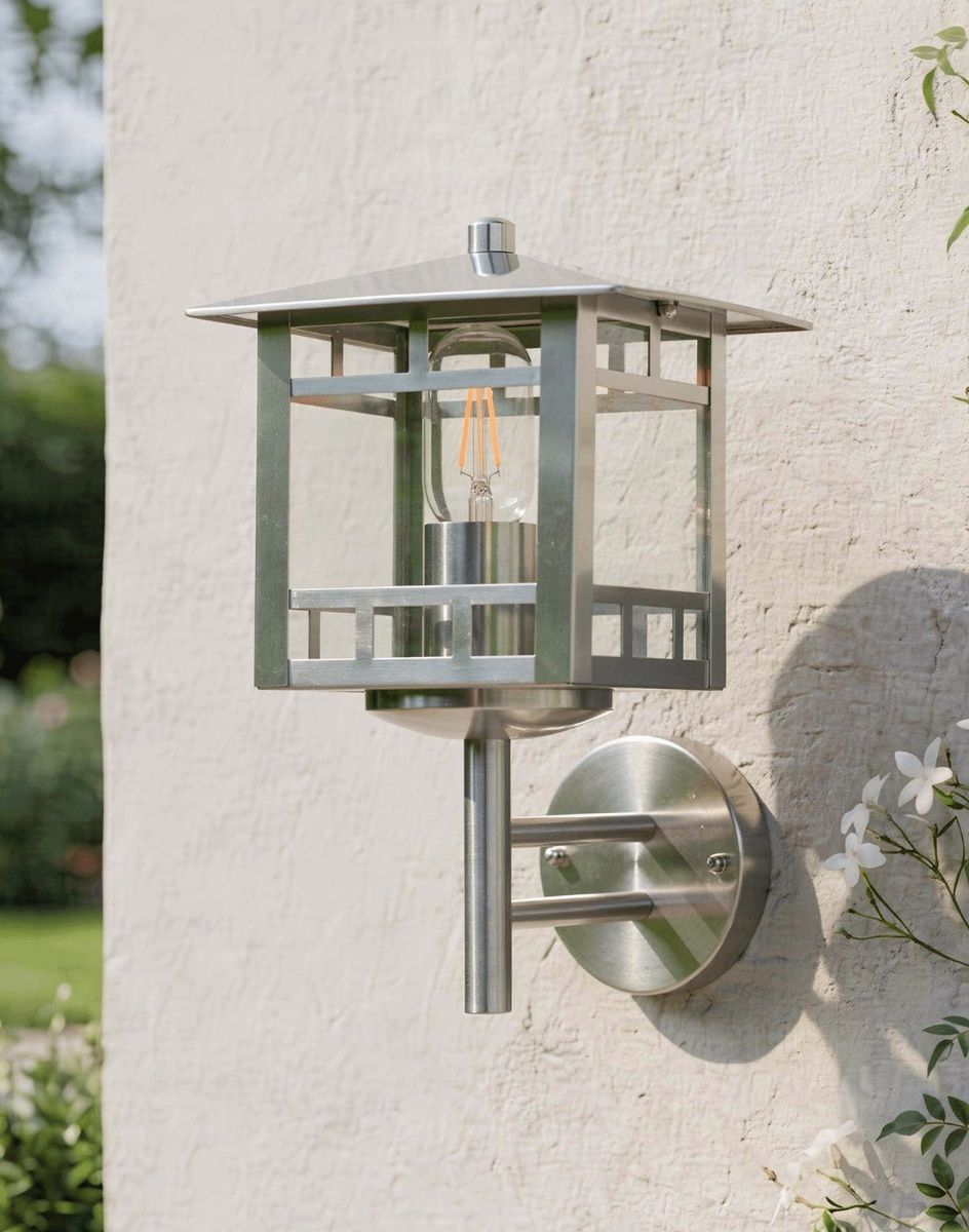 Digital Illustration of the "Narva" Stainless Steel Wall Lantern Mounted on a Sunny Garden Wall
