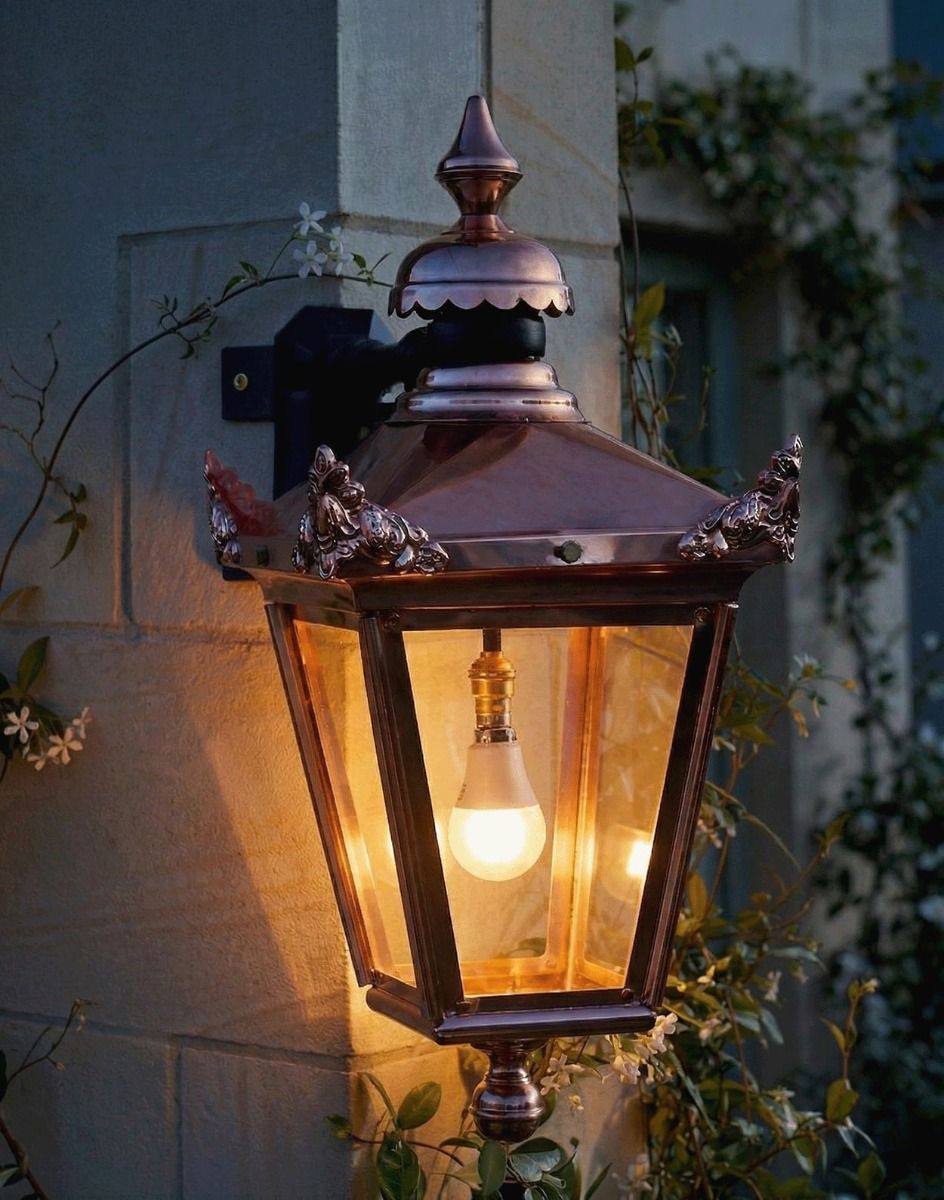 Digital Illustration of the 61 x 46cm Standard Copper Hanging Corner Wall Lantern Lit up at Night 