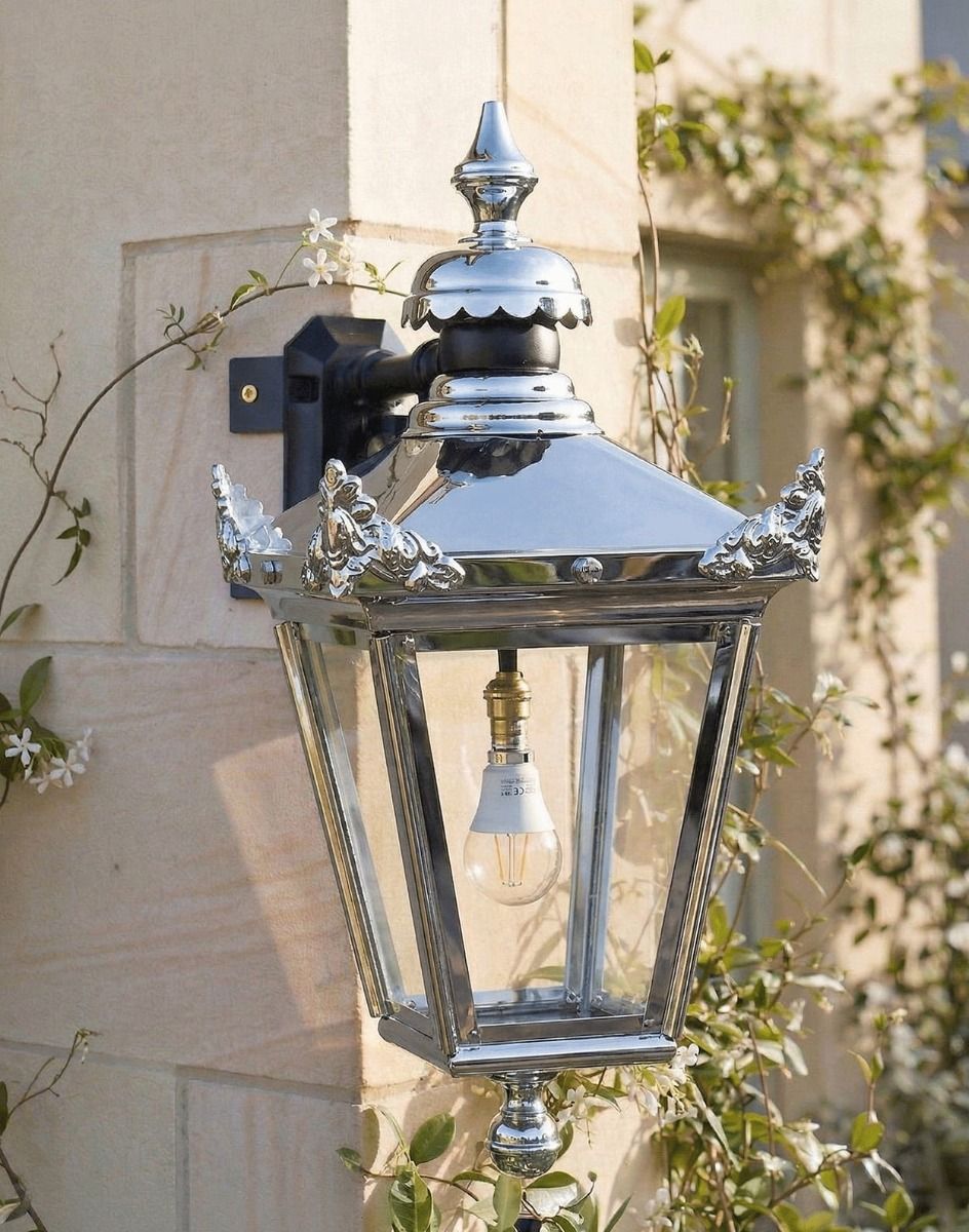 Digital Illustration of the 63 x 47.5cm Bright Chrome Suspended Corner Wall Lantern Mounted on a Limestone Brick Wall