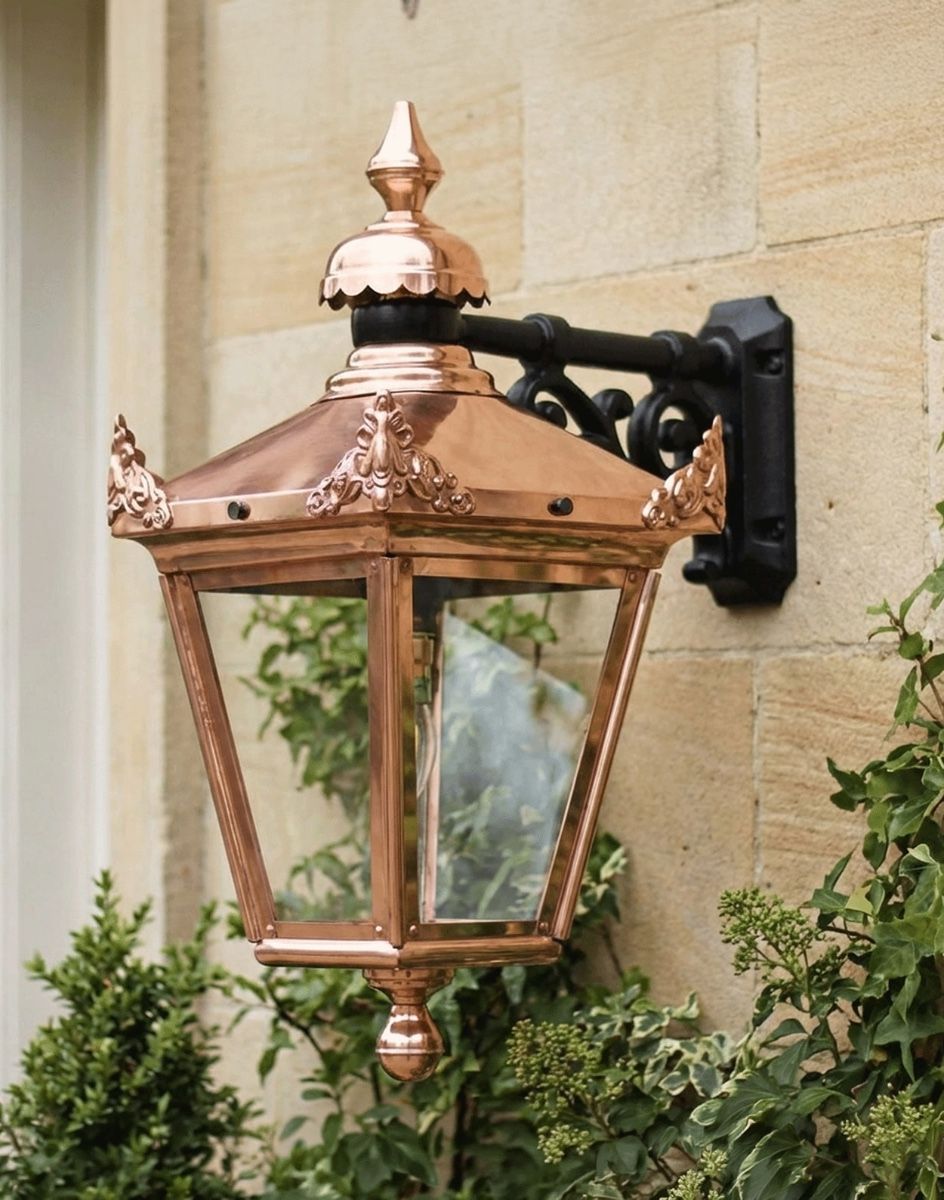 Digital Illustration of the 63 x 47.5cm Version of the Large Copper Hanging Wall Lantern Mounted on a Sandstone Brick Building
