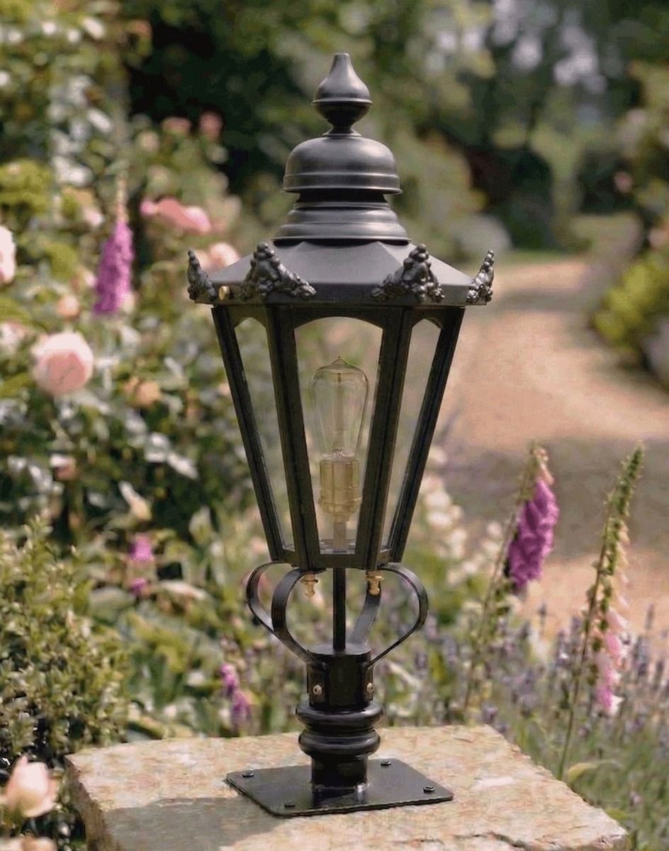 Digital Illustration of the 76cm Black Hexagonal Pillar Light and Lantern Set Mounted on a Stone Pillar in a Garden