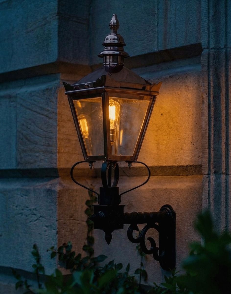 Digital Illustration of the 77 x 37cm Copper Harrogate Wall Lantern On a Royale Bracket Lit up at Night