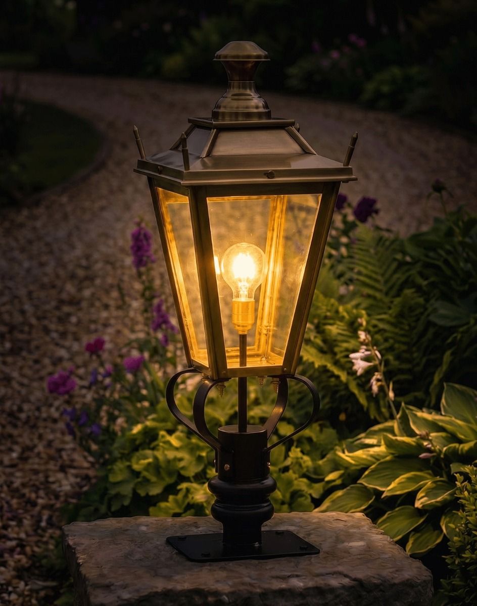 Digital Illustration of the 81cm Brass Dorchester Pillar Light and Lantern Set Mounted on a Stone Wall Garden Pillar and Lit up at Night