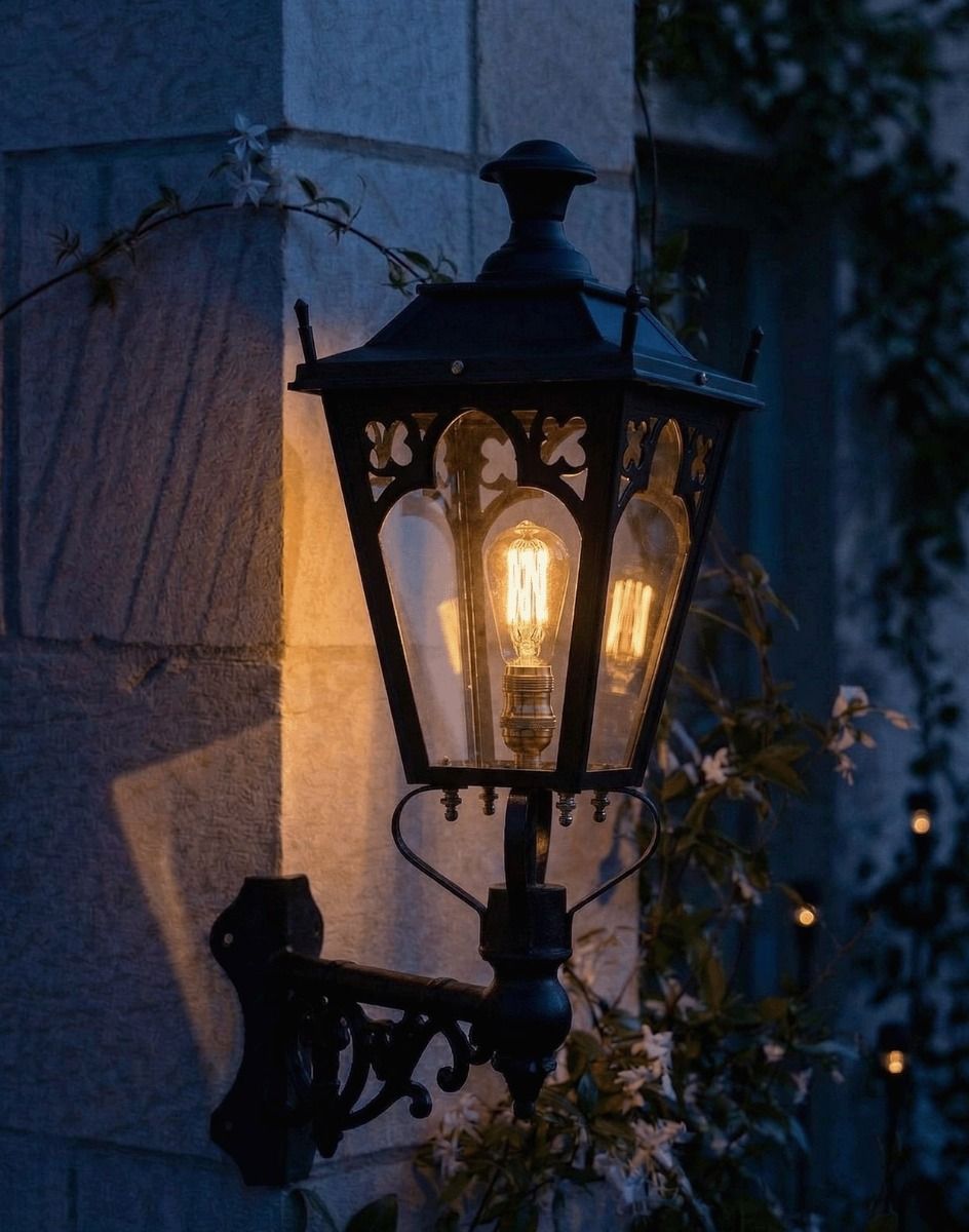 Digital Illustration of the 84 x 37cm Black Gothic Wall Lantern on Corner Bracket Lit up at Night