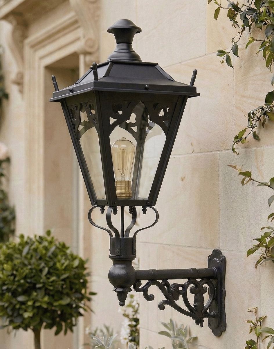 Digital Illustration of the 84 x 37cm Black Gothic Wall Lantern on Ornate Bracket Mounted on a Sandstone Brick House Porch