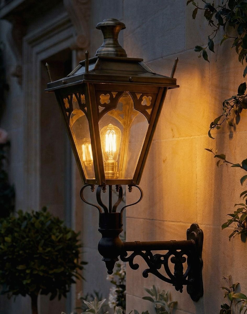 Digital Illustration of the 84 x 37cm Brass Gothic Wall Lantern on Ornate Bracket Lit up at Night 