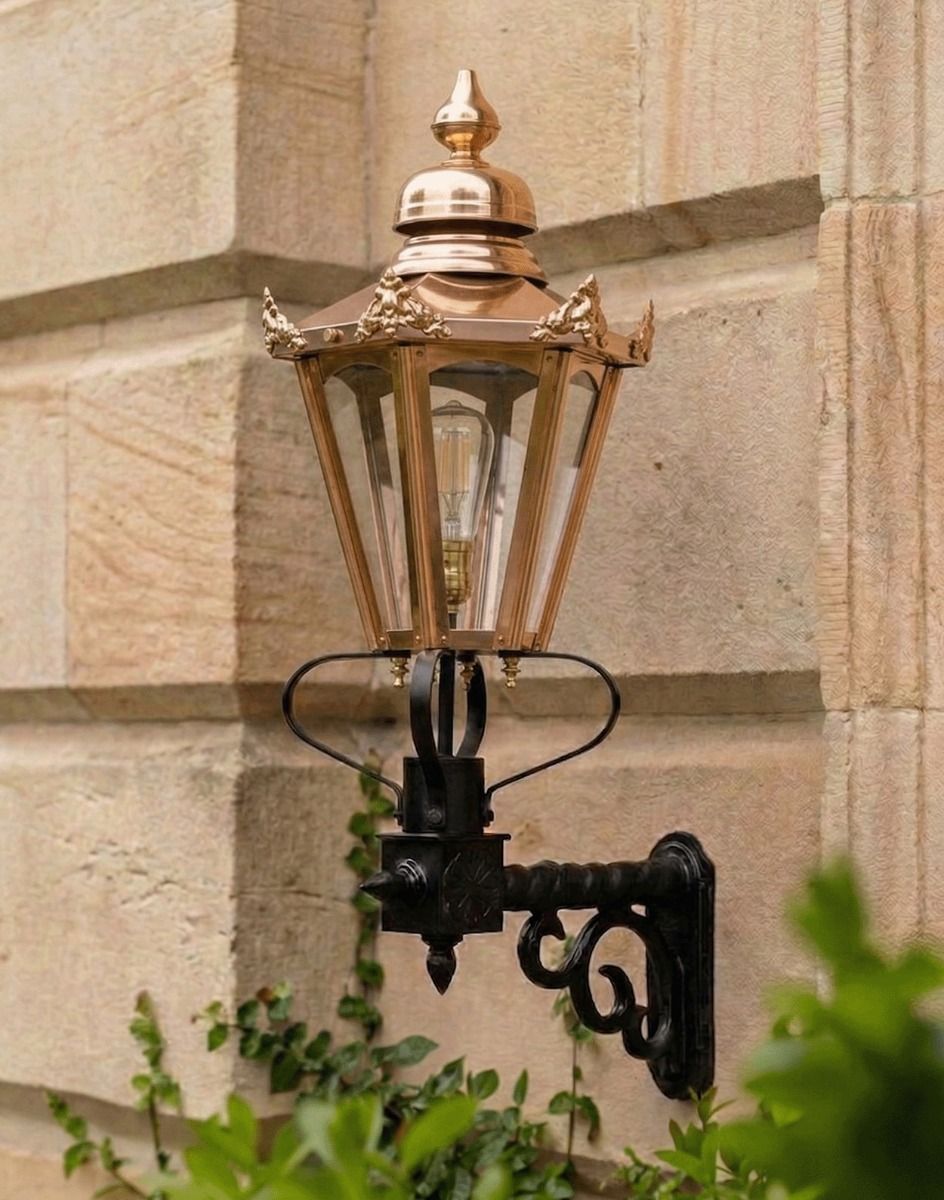 Digital Illustration of the 88 x 33cm Copper Hexagonal Wall Lantern on a Royale Bracket Mounted on a Traditional Sandstone Brick House Entrance 