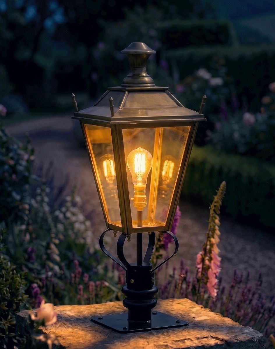 Digital Illustration of the 90cm Brass Dorchester Pillar Light and Lantern Set Mounted on a Stone Garden Pillar Whilst Lit up at Night