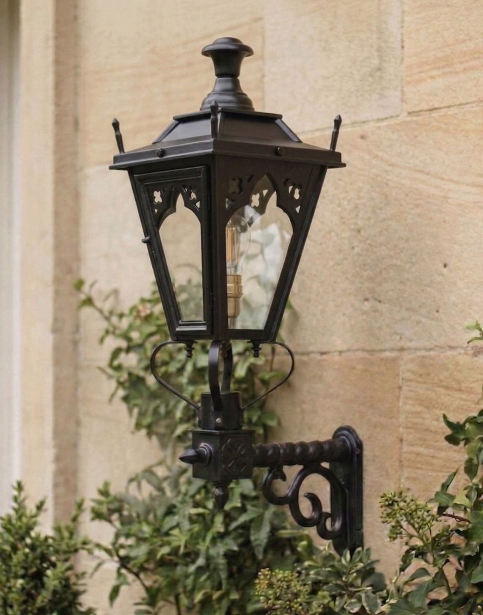 Digital Illustration of the 95 x 48cm Black Gothic Wall Lantern on Royale Bracket Mounted on a Sunny Sandstone Brick Wall