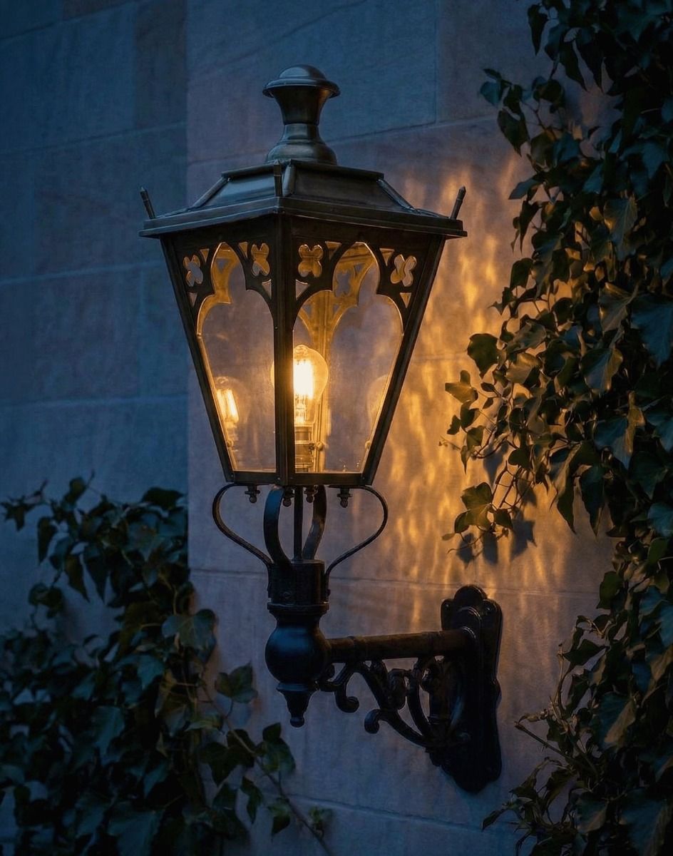 Digital Illustration of the 95 x 48cm Brass Gothic Wall Lantern on an Ornate Bracket Lit up at Night