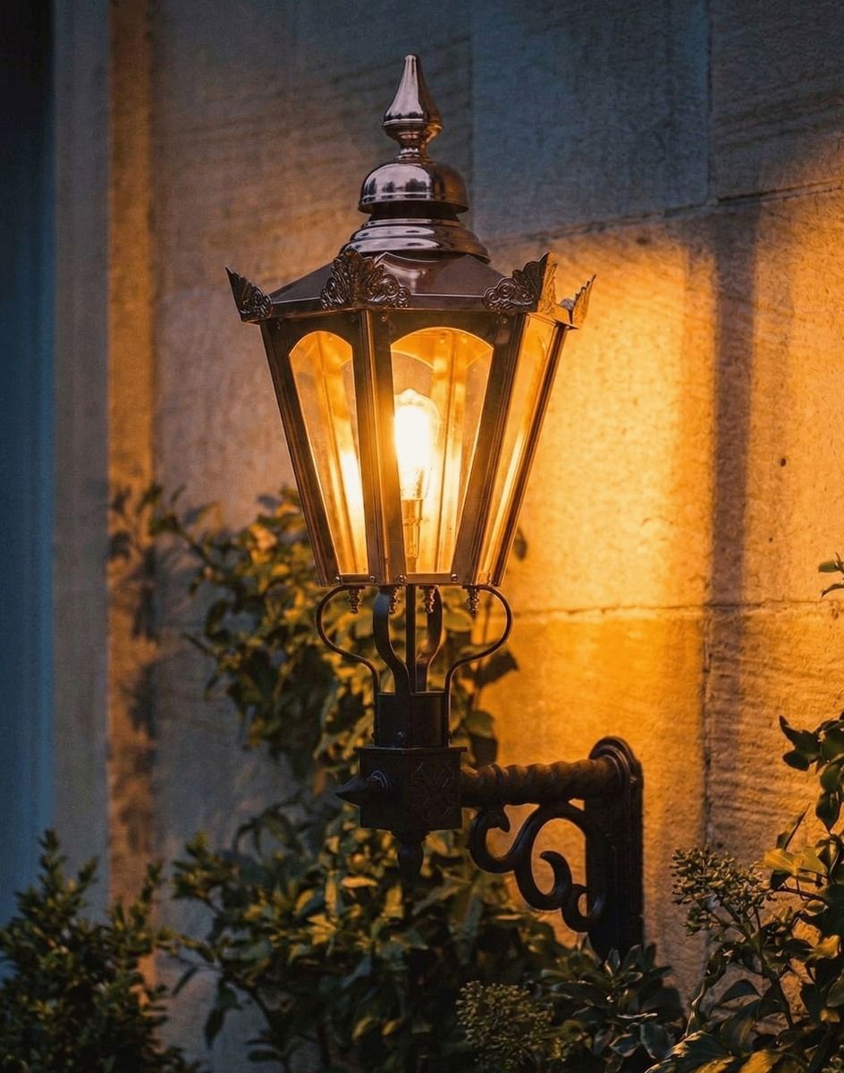 Digital Illustration of the 98 x 46cm Copper Hexagonal Wall Lantern on a Royale Bracket Lit up at Night