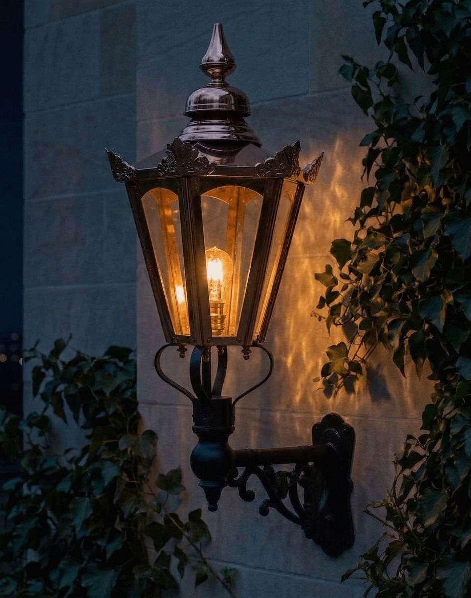 Digital Illustration of the 98 x 46cm Copper Hexagonal Wall Lantern on Ornate Bracket Lit up at Night 