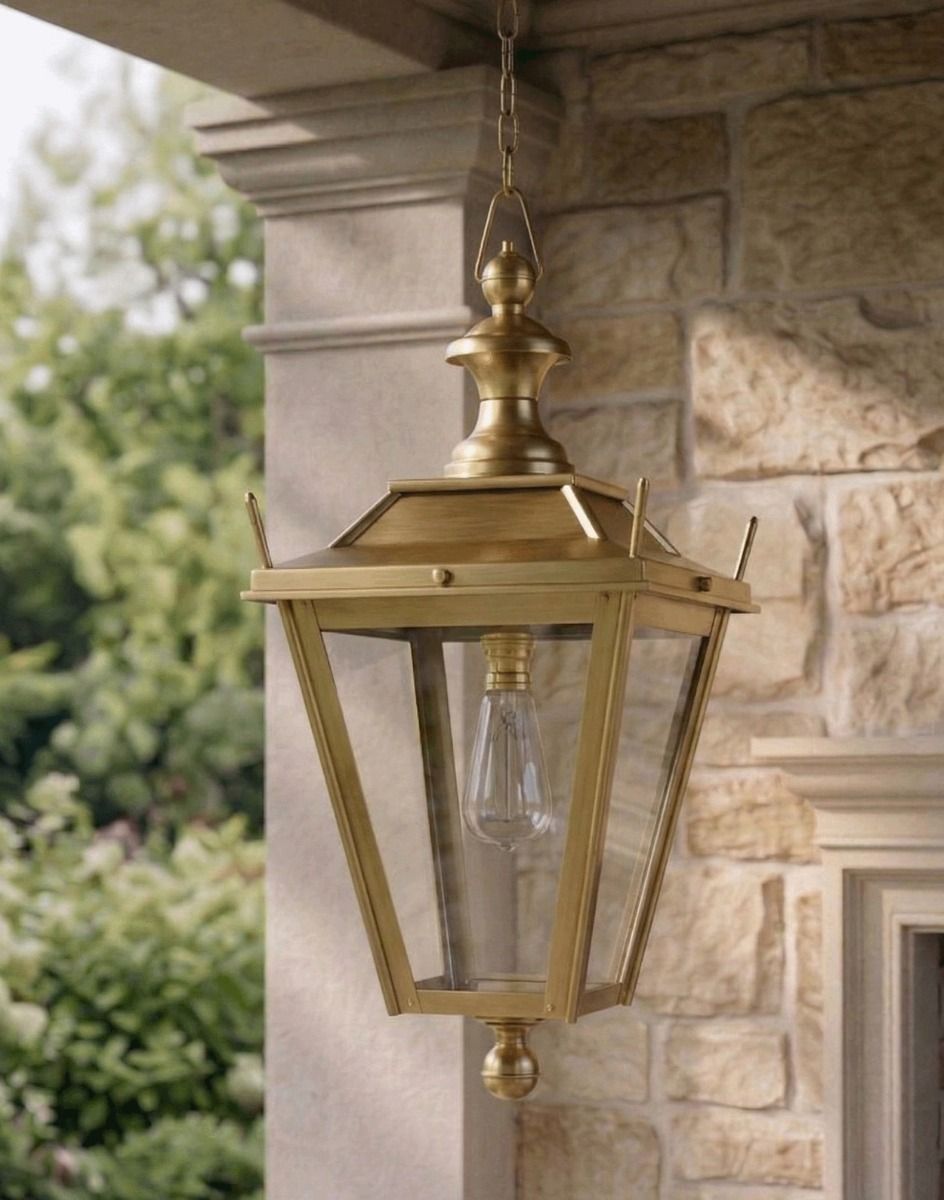 Digital Illustration of the Antique Brass Dorchester Garden Hanging Lantern Suspended Above a Decorative Porch