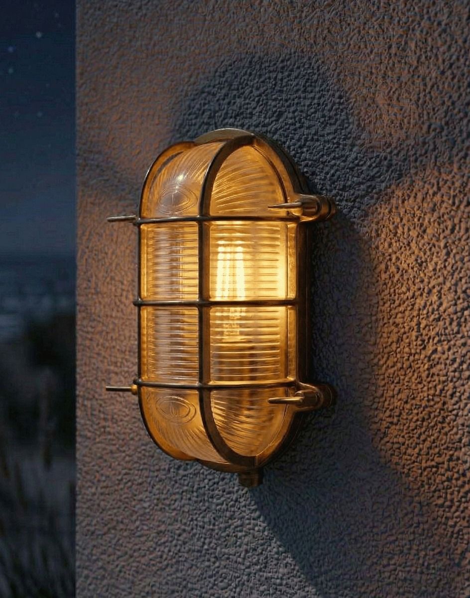 Digital Illustration of the Antique Brass Nautical "Bayside" Bulkhead Wall Light Lit up at Night