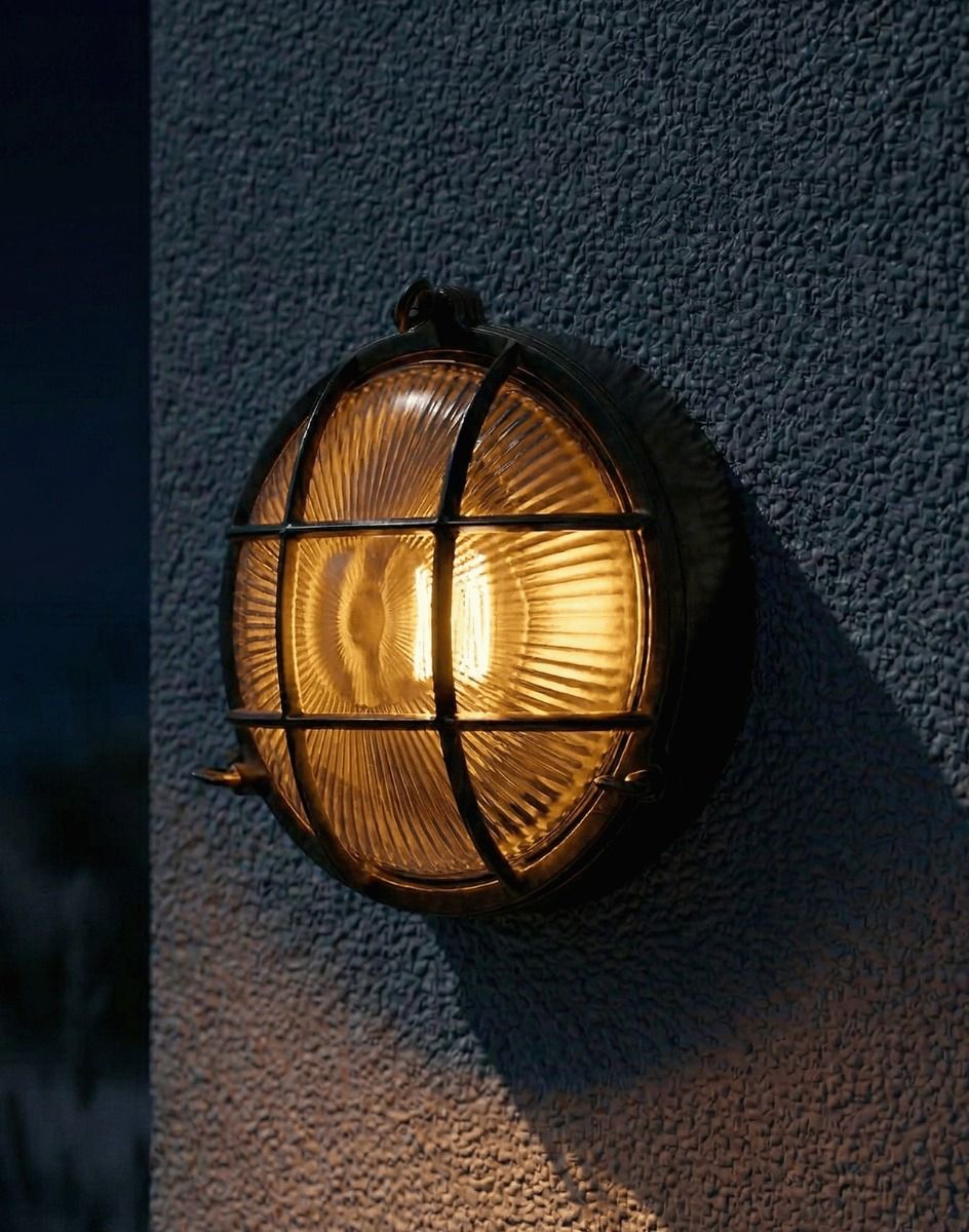 Digital Illustration of the Antique Brass Nautical "Bow" Wall Light Lit up at Night