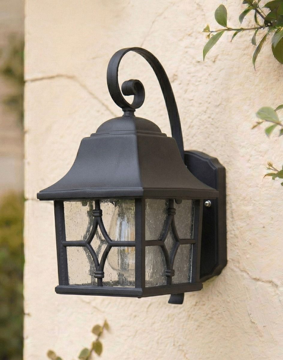 Digital Illustration of the Black "Alford" Traditional Wall Lantern Mounted on a White Coloured Garden Building 