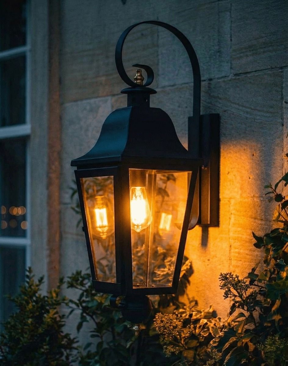 Digital Illustration of the Black "Cleobury" Wall Lantern Lit up at Night