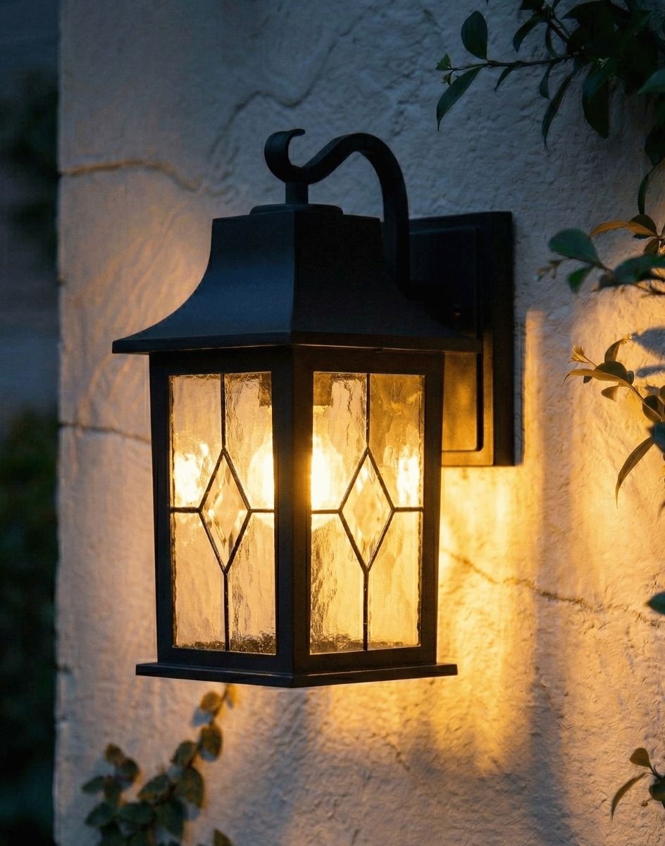 Digital Illustration of the Black "Newham" Traditional Rectangular Top Fix Wall Lantern Lit up at Night