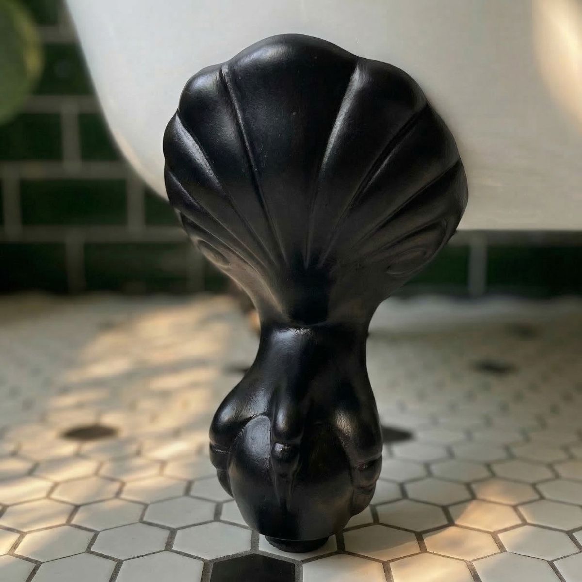 Digital Illustration of the Black Ball & Claw Bath Feet Mounted on a Traditional White Bath