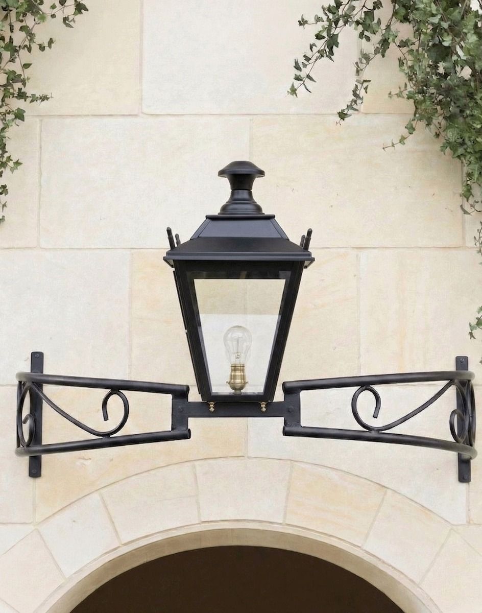 Digital Illustration of the Black Dorchester Bow Bracket Light Mounted Abouve a Grand Limestone Brick Archway