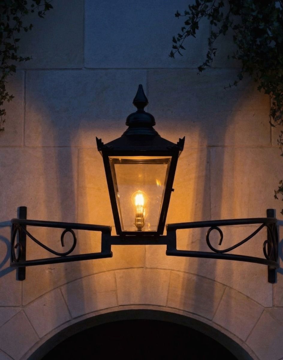 Digital Illustration of the Black Victorian Bow Bracket Light Lit up at Night