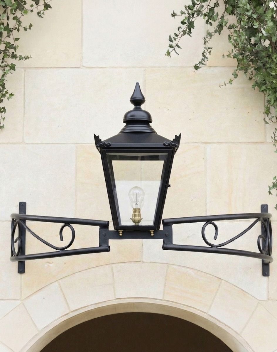 Digital Illustration of the Black Victorian Bow Bracket Light Mounted Above a Grand Stone Archway