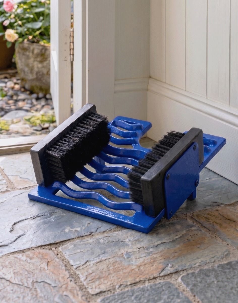 Digital Illustration of the Blue Three in One Boot Jack Boot Brush and Scraper in a Contemporary Stone Hallway Entrance