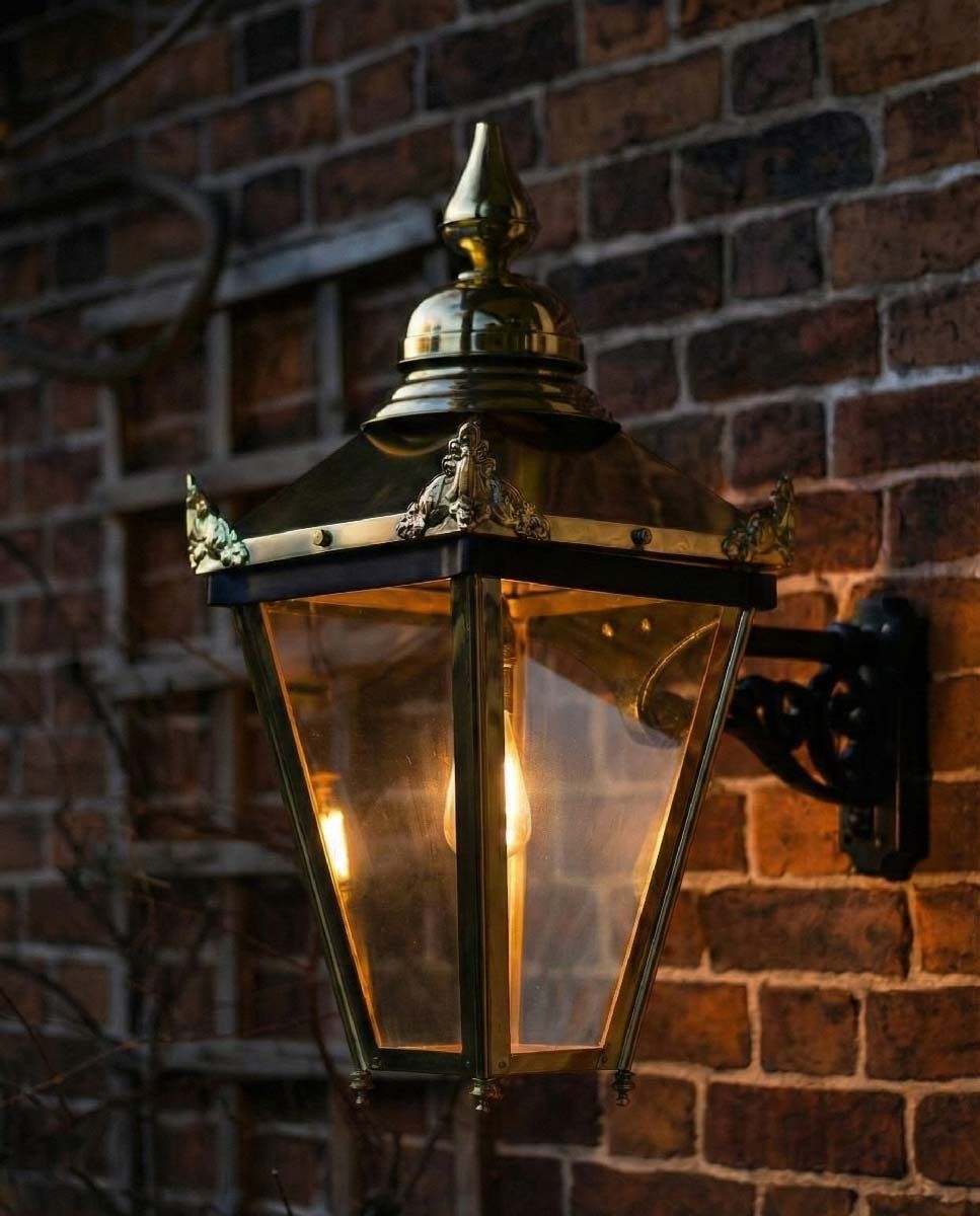 Digital Illustration of the Brass "Sunningdale" Lantern On Ornate Wall Bracket Illuminated at Night