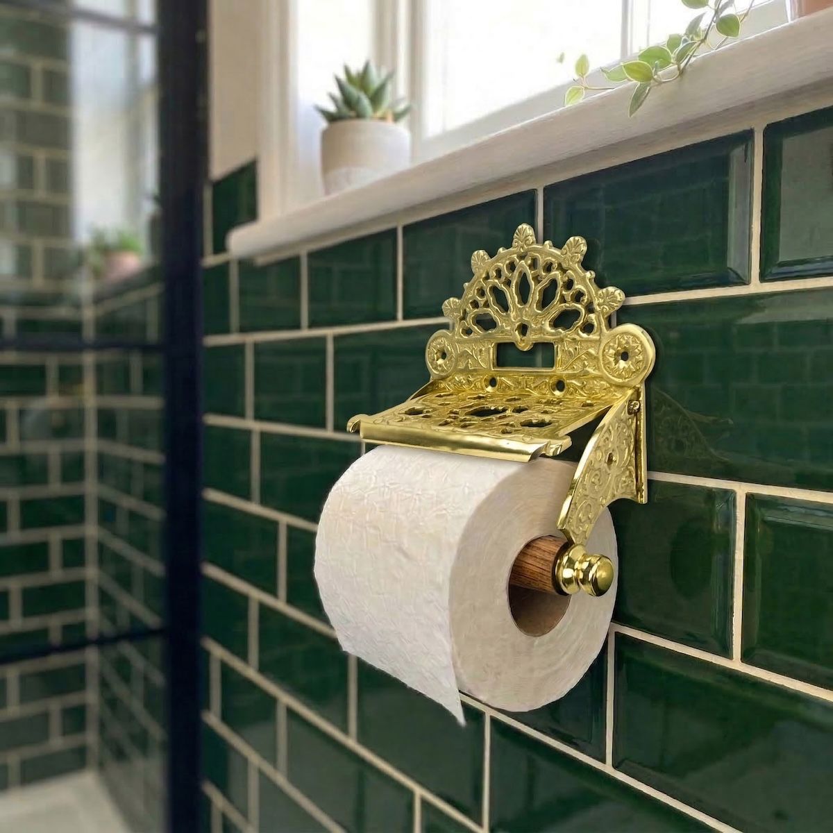 Digital Illustration of the Brass Version of the Sunrise Toilet Roll Holder Holding Toilet Roll from an Angled View