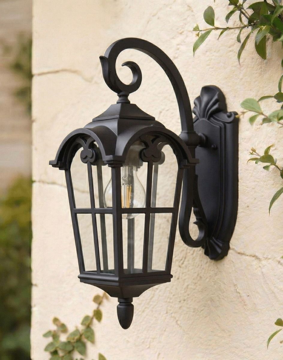 Digital Illustration of the Bronze Version of the Traditional "Giovanna" Top Fix Outdoor Wall Lantern Mounted on a White Coloured Garden Wall 