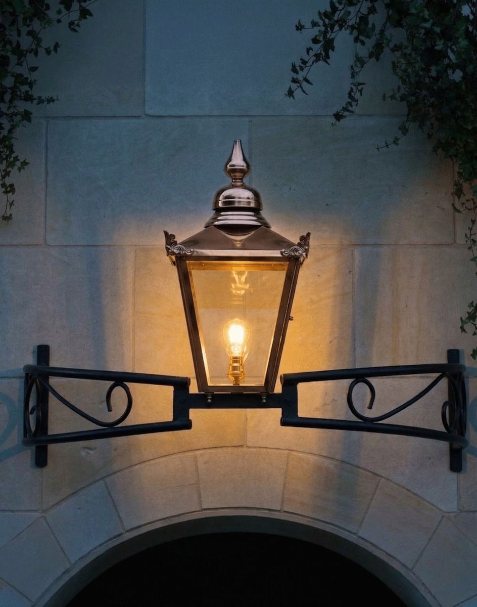 Digital Illustration of the Copper Victorian Bow Bracket Light Lit up at Night