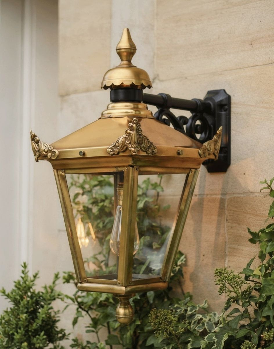 Digital Illustration of the Large 63 x 47.5cm Version of the Antique Brass Hanging Wall Lantern Mounted on a Sandstone Bricked Wall 