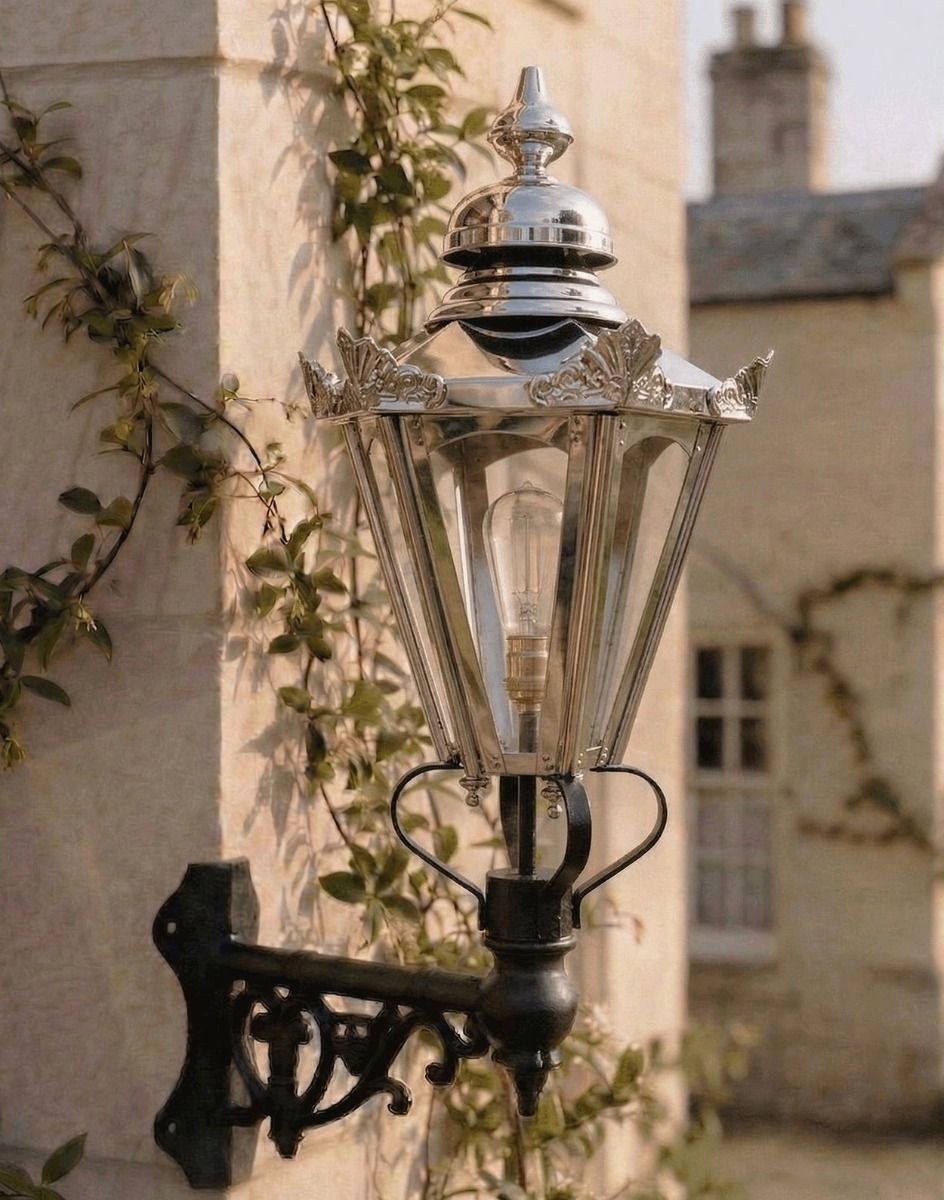 Digital Illustration of the Large Polished Nickel Concordia Hexagonal Lantern On a Corner Bracket Mounted on a Sunny Sandstone Brick Wall