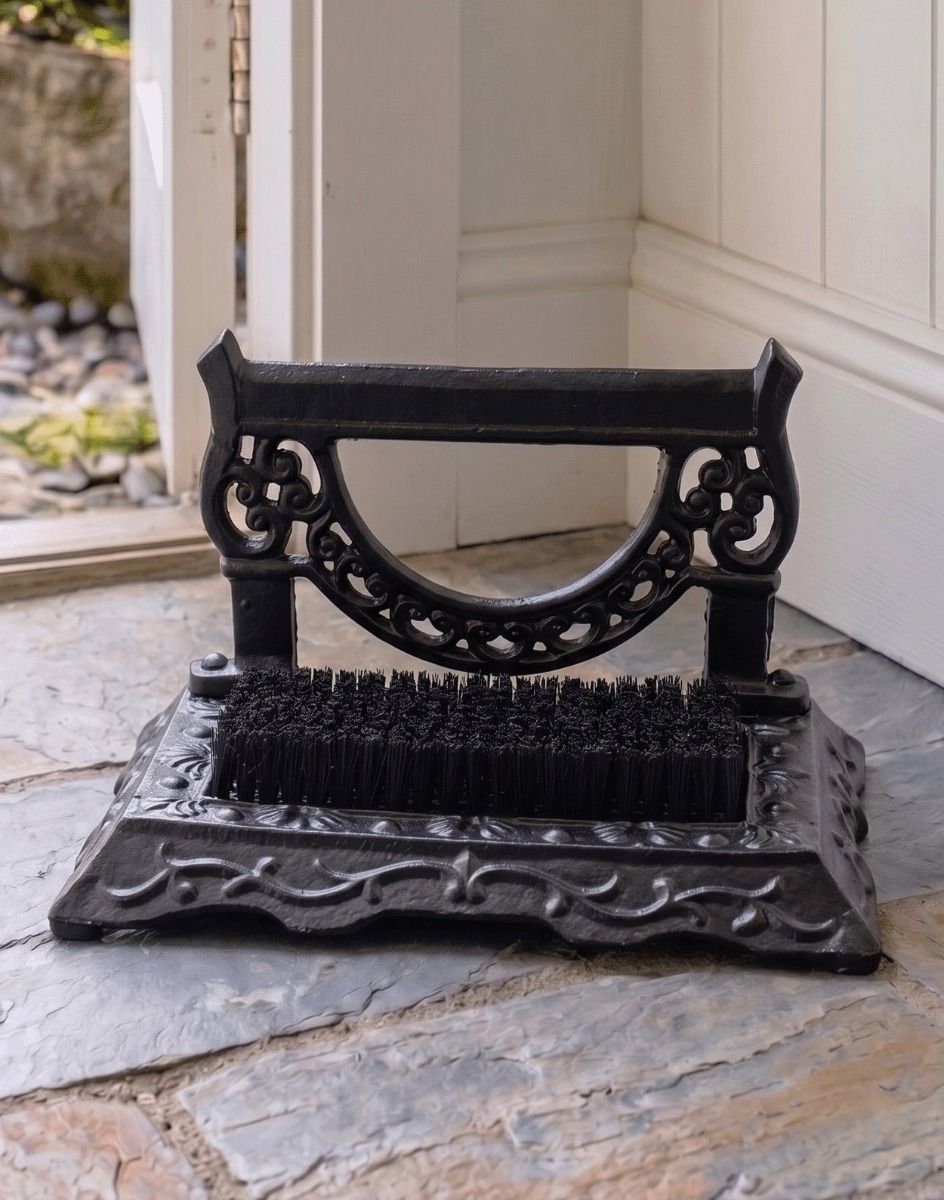 Digital Illustration of the Mallory Victorian Styled Boot Brush & Scraper Positioned on a Stone Floor Cottage Hallway