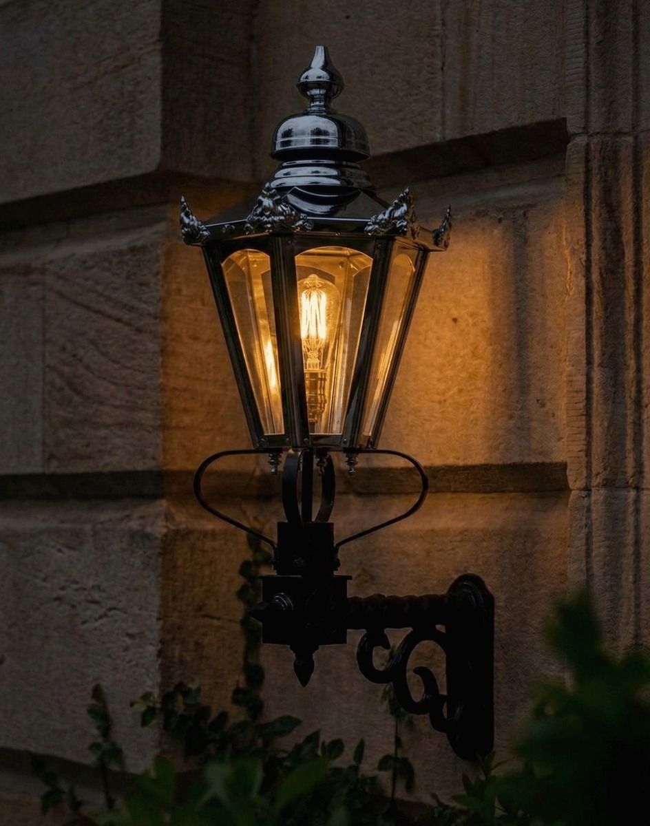 Digital Illustration of the Polished Nickel Standard Concordia Hexagonal Lantern On a Royale Bracket Lit up at Night