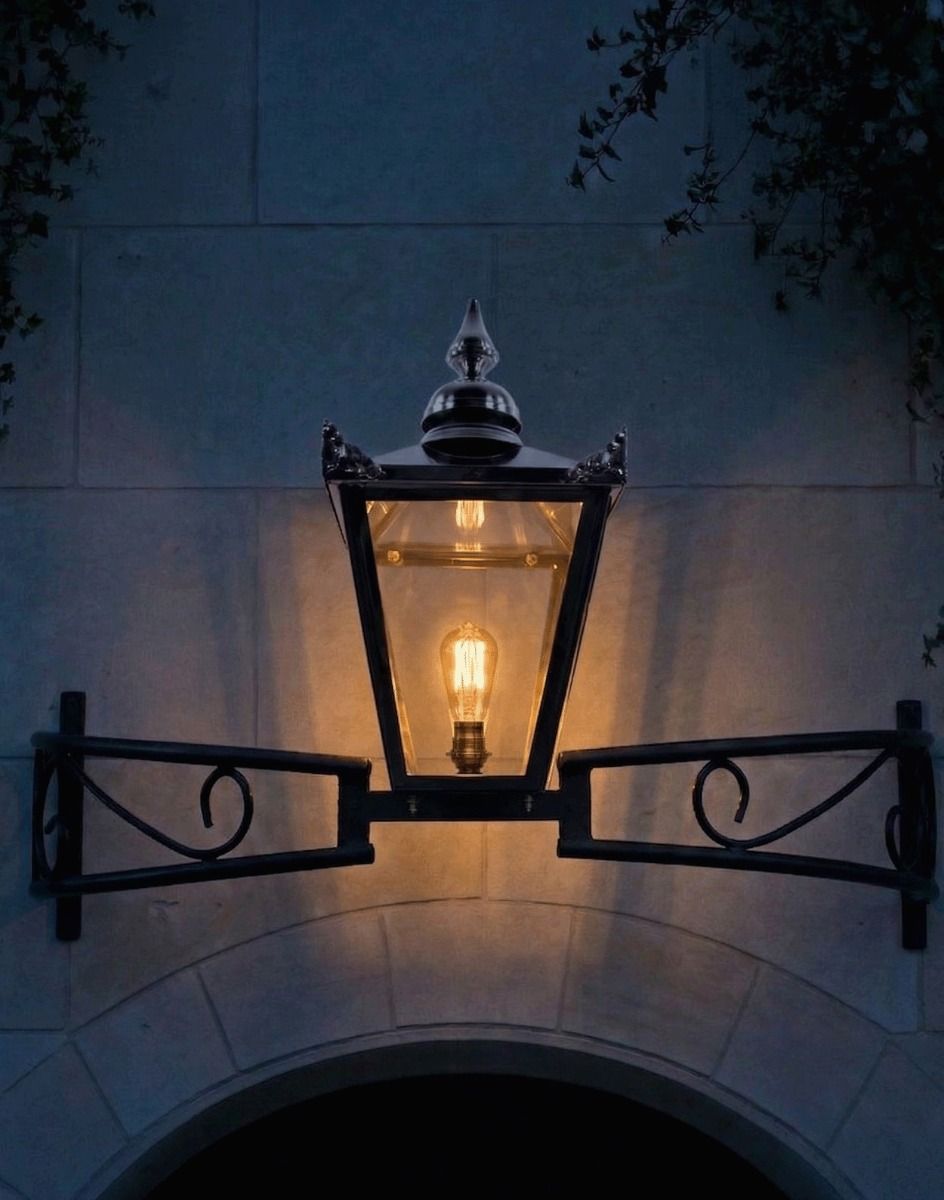 Digital Illustration of the Polished Nickel Victorian Bow Bracket Light Lit up at Night