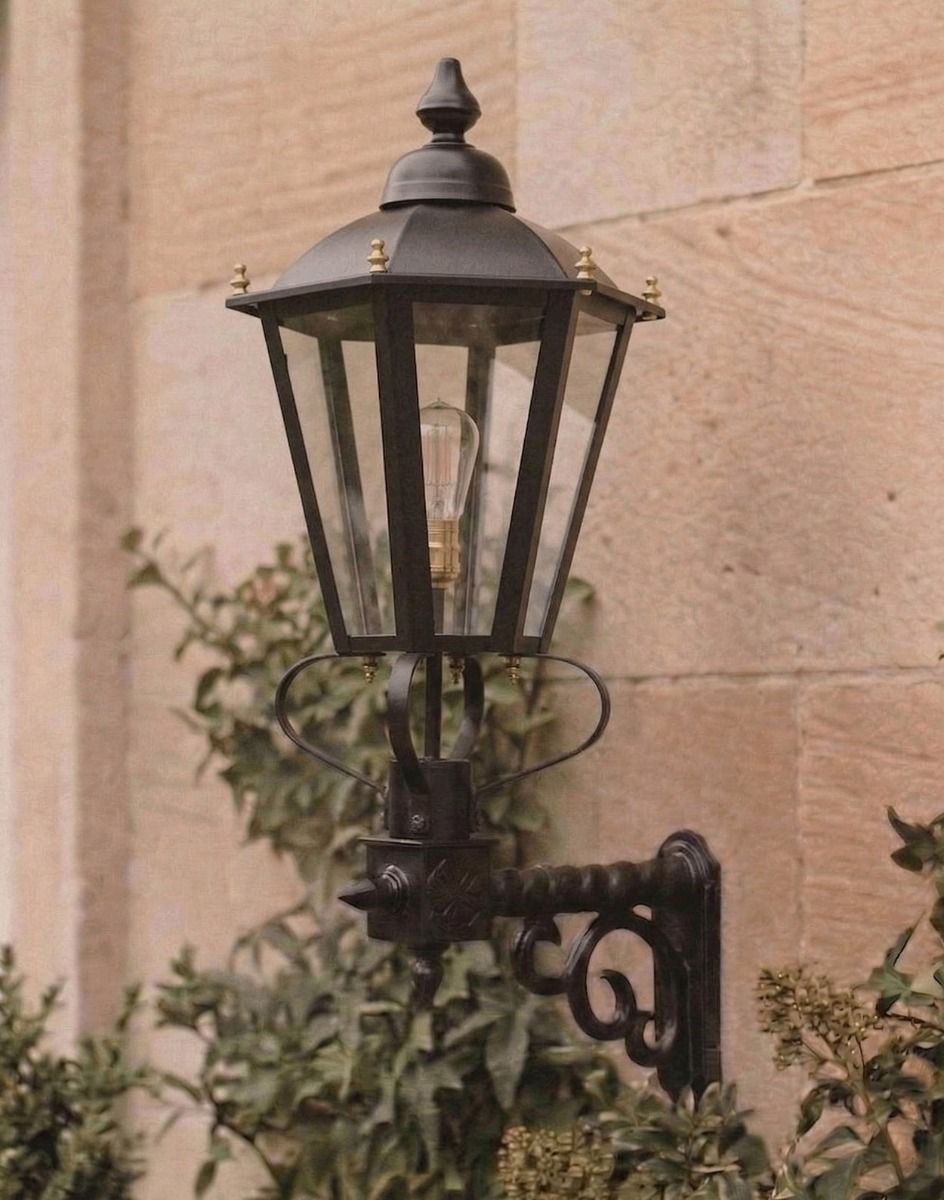 Digital Illustration of the Six Sided Victorian Black Wall Light Mounted on a Sandstone Brick Traditional Building