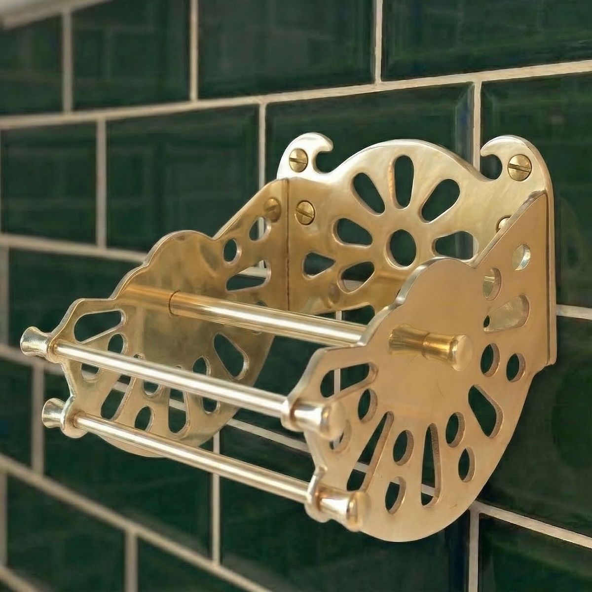 Digital Illustration of the Brass Version of The Victorian ”Mitchell” Toilet Roll Dispenser that is Empty from an Angled View