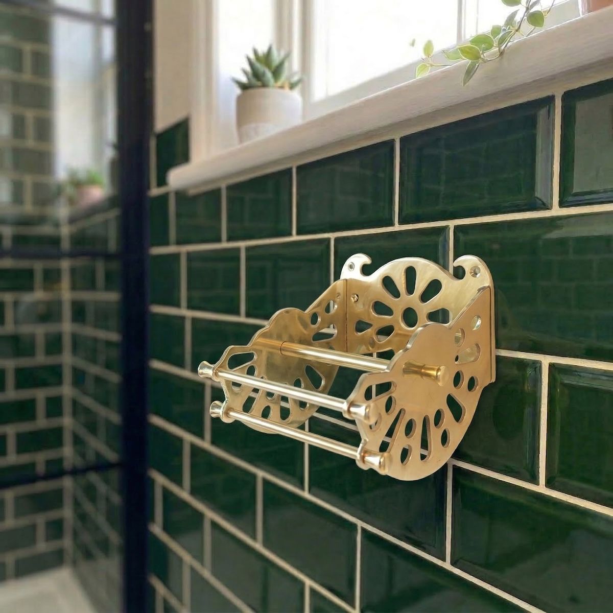 Digital Illustration of the Brass Version of The Victorian ”Mitchell” Toilet Roll Dispenser that is Empty from an Angled View