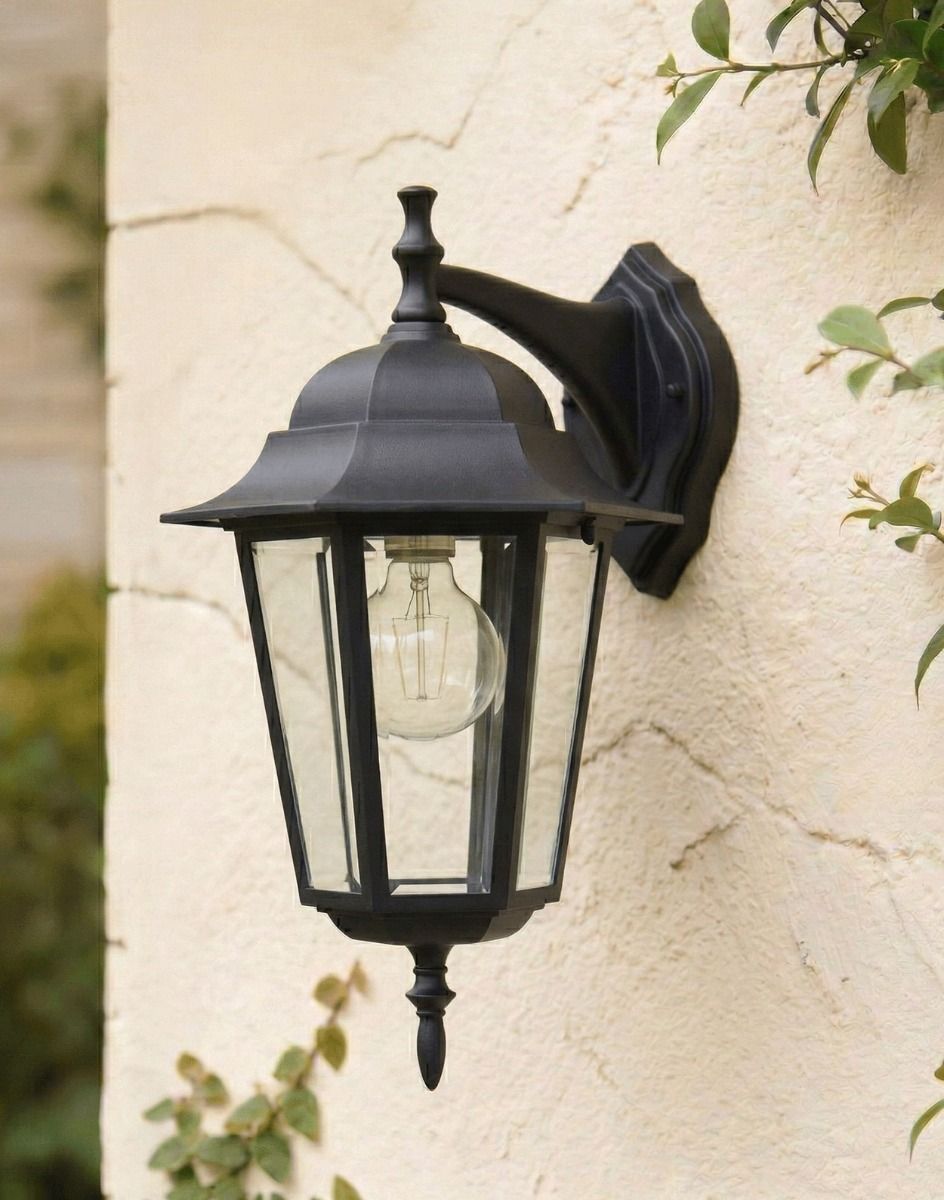 Digital Illustration of the Traditional "Cambridge Manor" Top Fix Wall Lantern Mounted on a Cream Coloured Garden Wall 