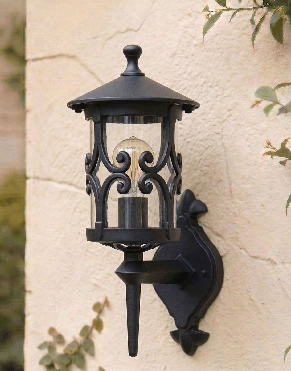 Digital Illustration of the Traditional "Ebberton" Scrolled Design Bottom Fix Wall Lantern Mounted on a White Coloured Sunny Garden Wall