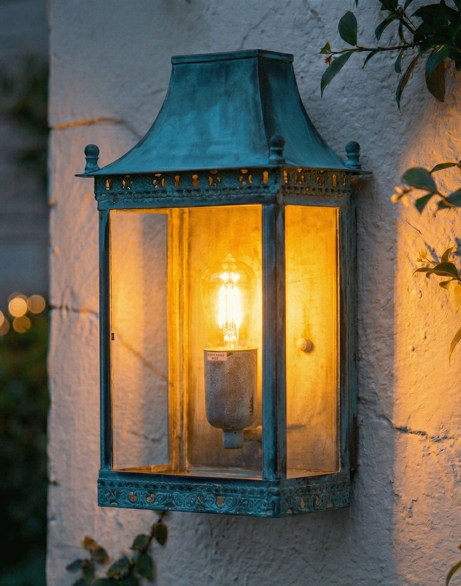Digital Illustration of the Verdigris Finished "Henlow" Traditional Wall Lantern Lit up at Night