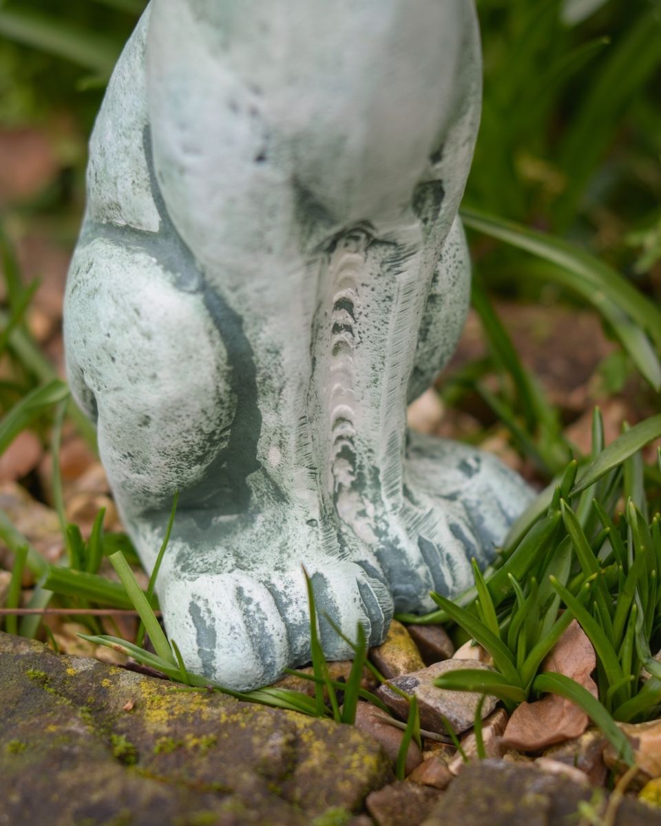 Digital illustration of Verdant Watchers Pair of Sitting Rabbit Garden Sculpture Cast Aluminium close up of base