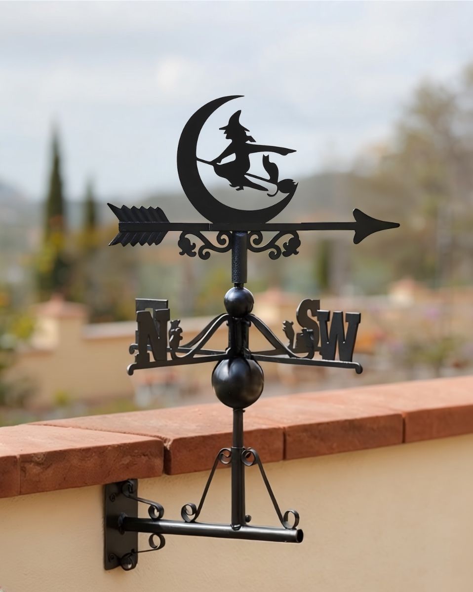 Digital illustration of weathervane witch mounted on a terrace wall
