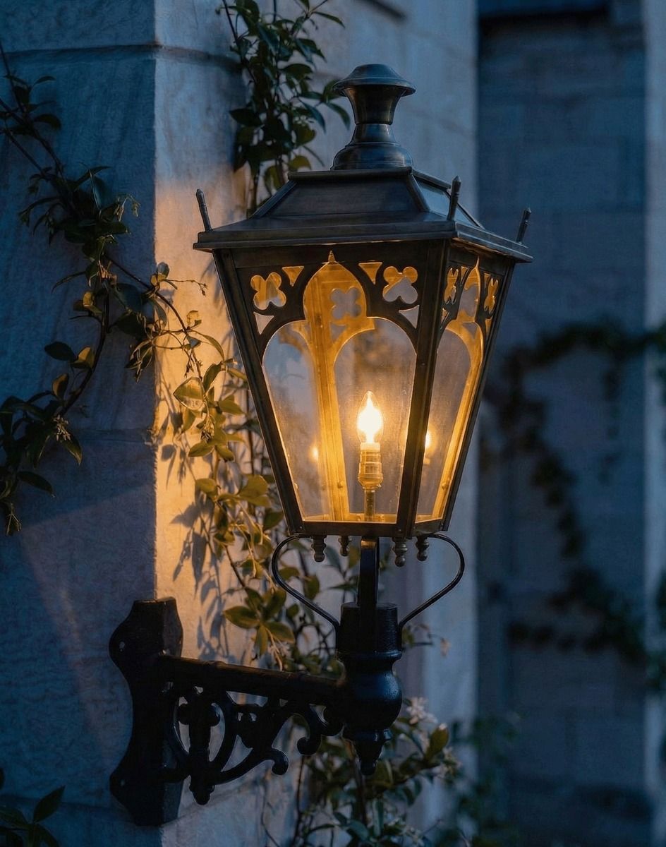 Digital Illustration of the 102 x 54cm Brass Gothic Wall Lantern on Corner Bracket Lit up at Night
