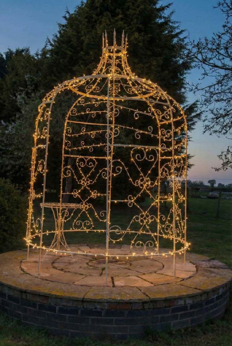 Digital representation of "Rapunzel" Cream Tower Top Gazebo lit up at night